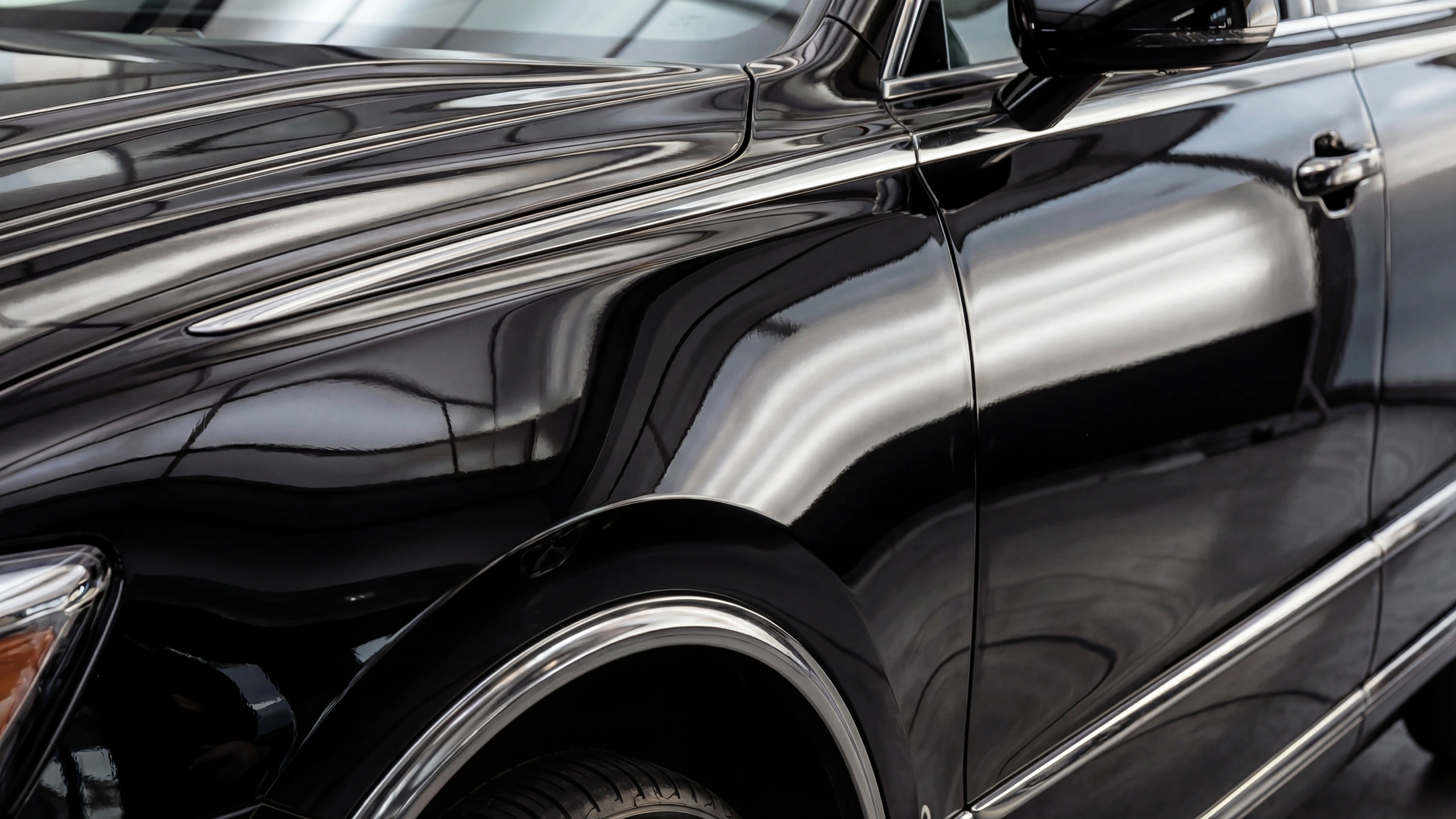 Happy customer with repaired vehicle